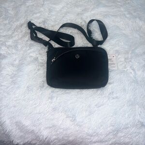 Lululemon Athletica Curved Lines Crossbody Bag
Black